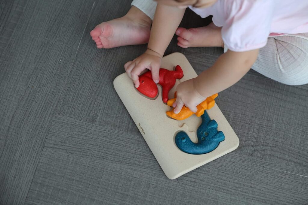 פאזל משפחת דינוזאורים מעץ Plan Toys